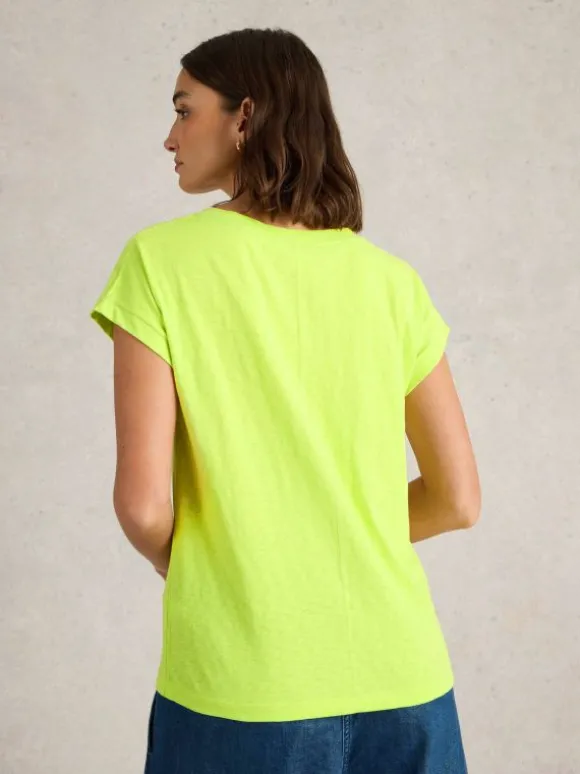 nelly_notch_neck_short_sl_2-1.webp NELLY NOTCH NECK SHORT SLEEVE TEE in BRIGHT YELLOW